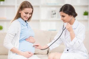 doctor with pregnant woman